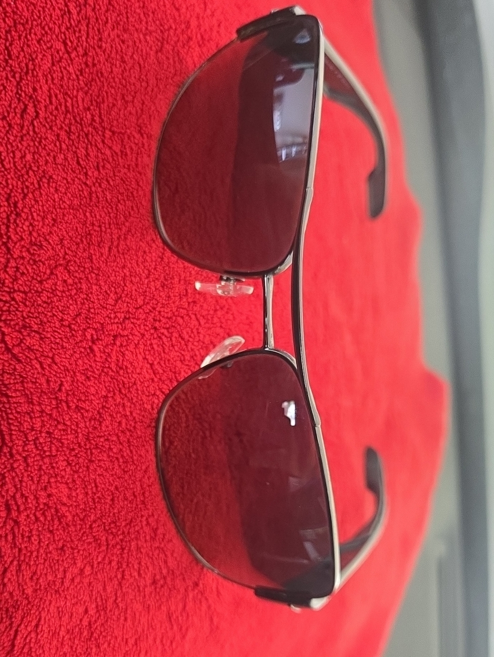 Prada Black Metal Sunglasses with Dark Red Lenses